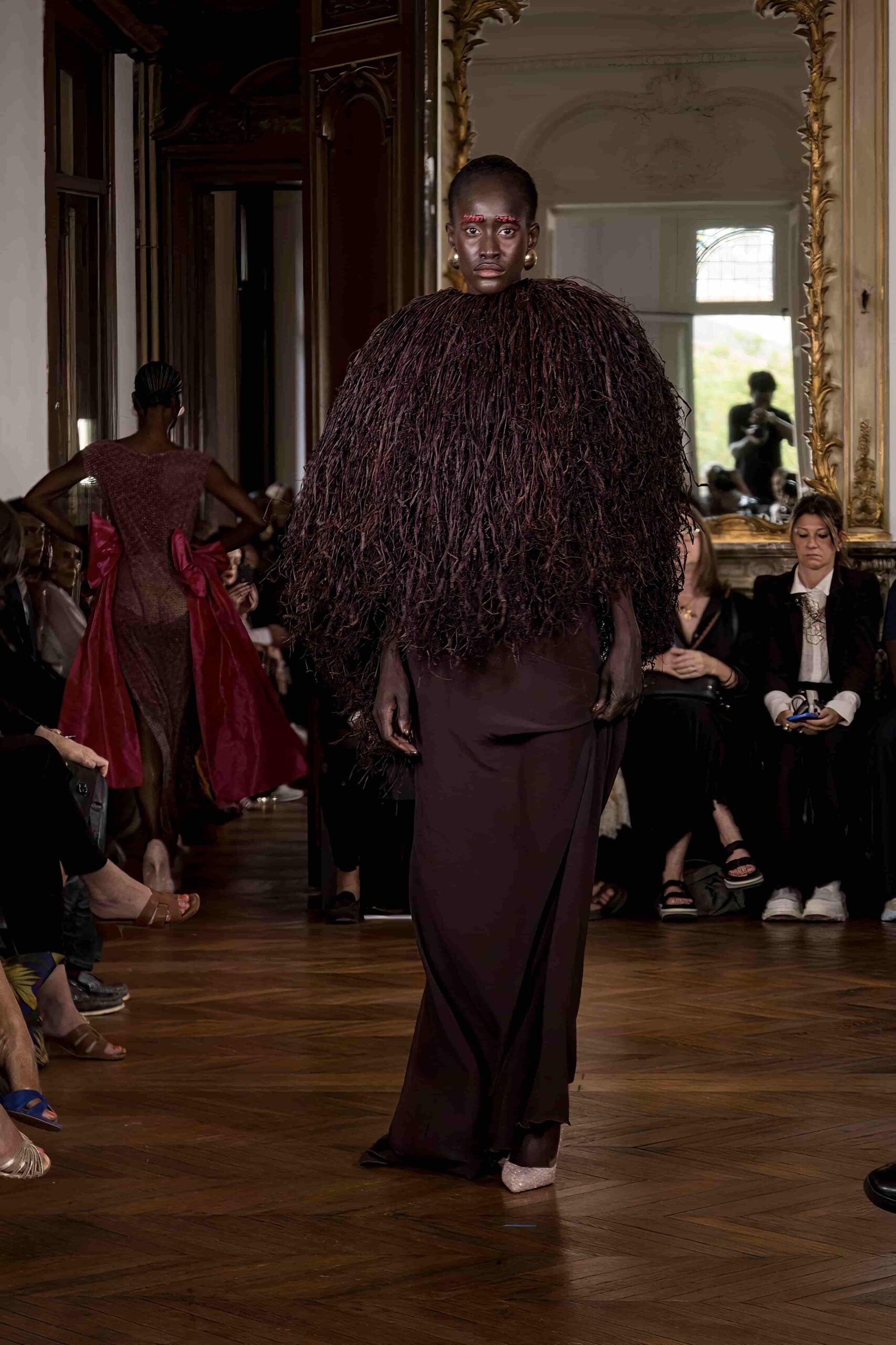 Jacket in Cameroonian raffia and bias-cut skirt in silk crepe