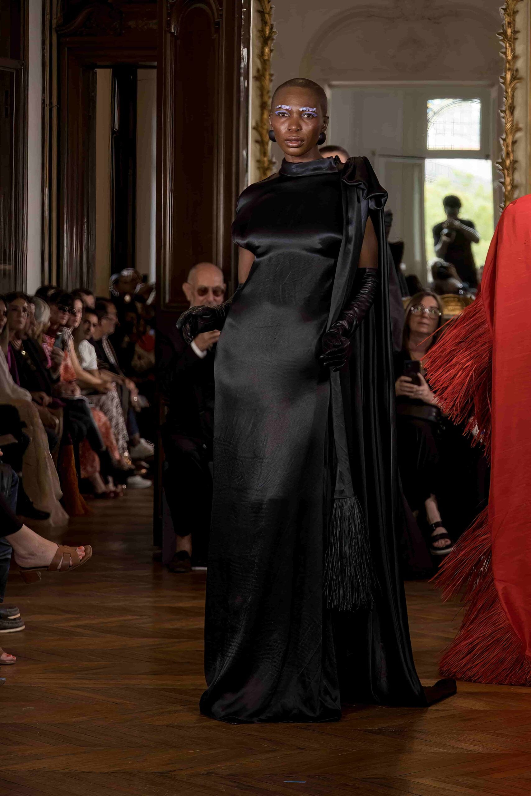 Long satin dress with a raffia fringed bow