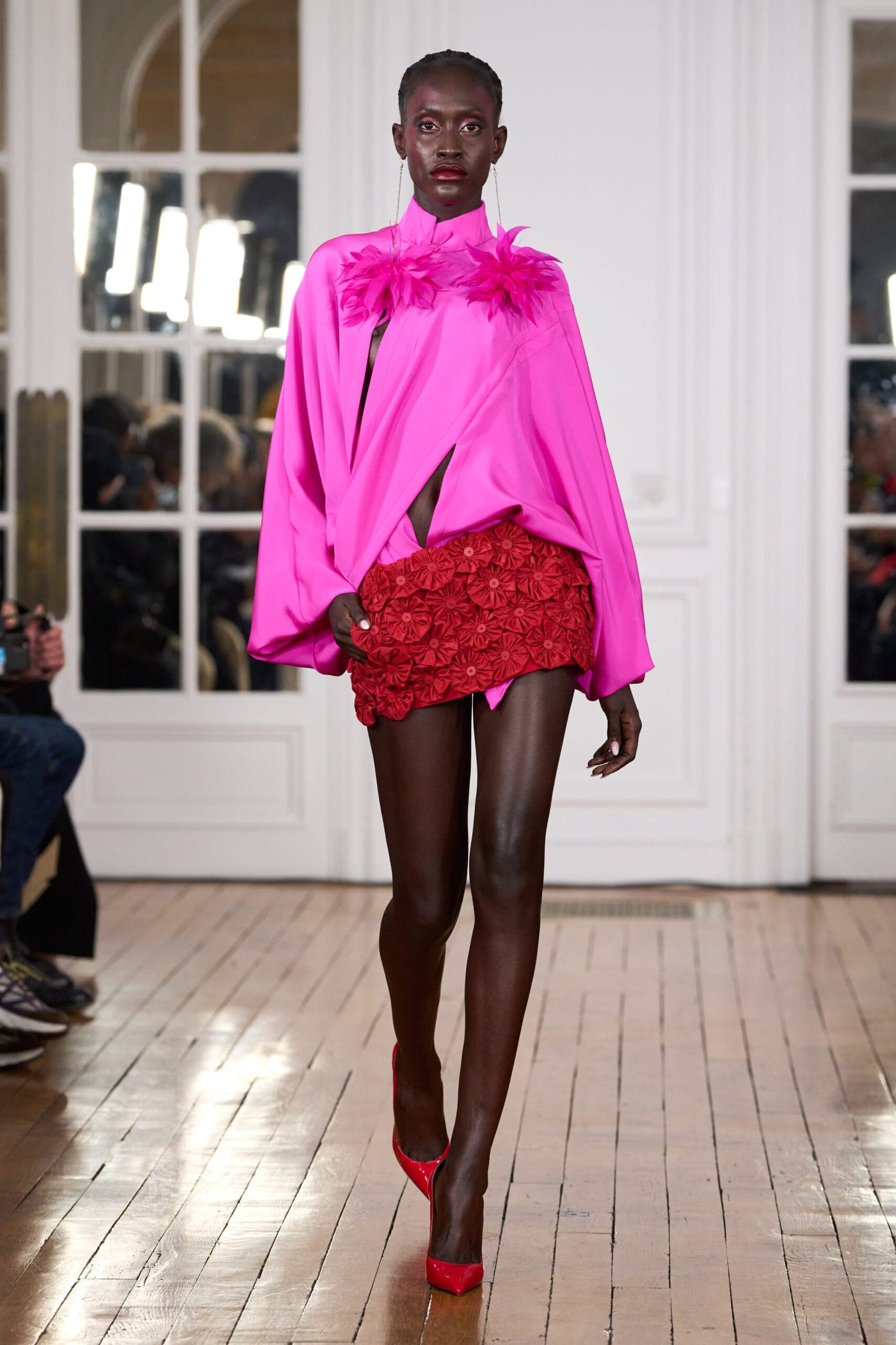 Draped silk crepe shirt, silk mini-skirt embroidered with yoyo flowers in silk taffeta, heishi beads and glass beads from Ghana